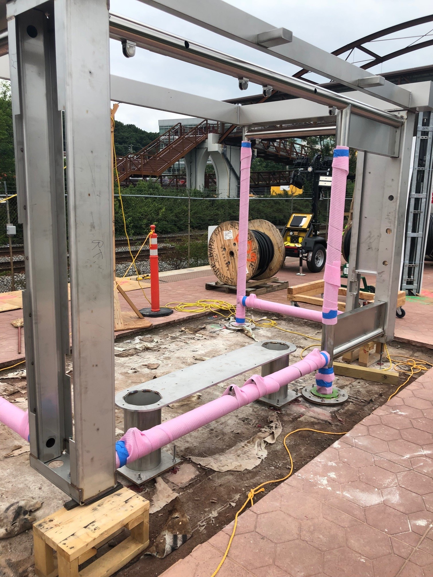Stainless-steel platform shelter installation at Deanwood